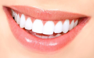 A tooth with the facebook logo on it.