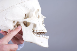 A tooth with the facebook logo on it.